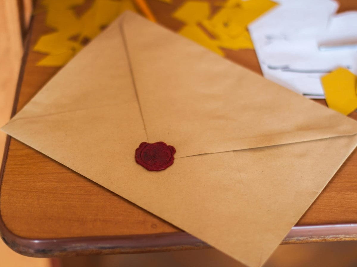 A real estate broker in Miami reviewing a global compliance checklist before mailing international buyer contracts.