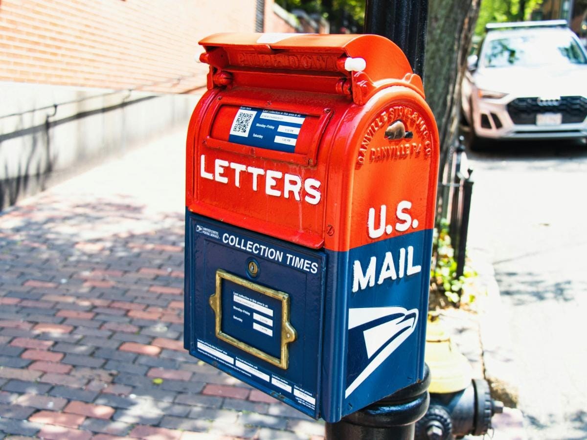 Business envelopes prepared with discount Flag Forever stamps for customer returns