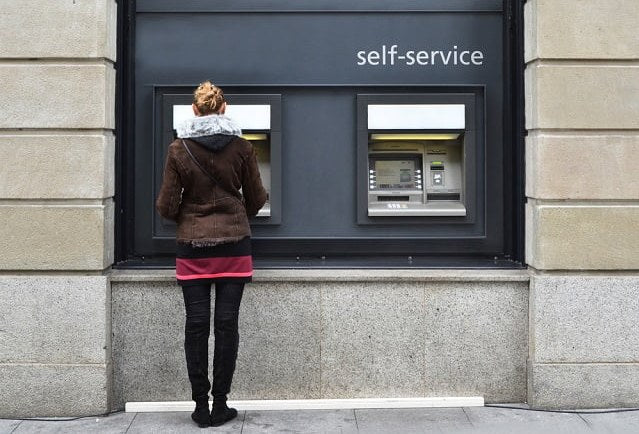 buying stamps from an ATM